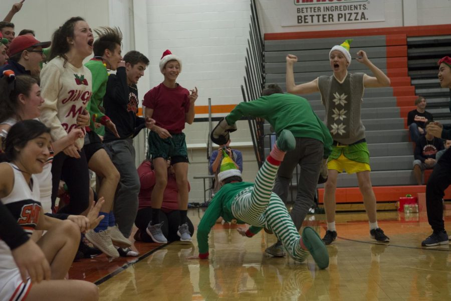 Junior Dawson Mesh riles up the junior section during their skit. 