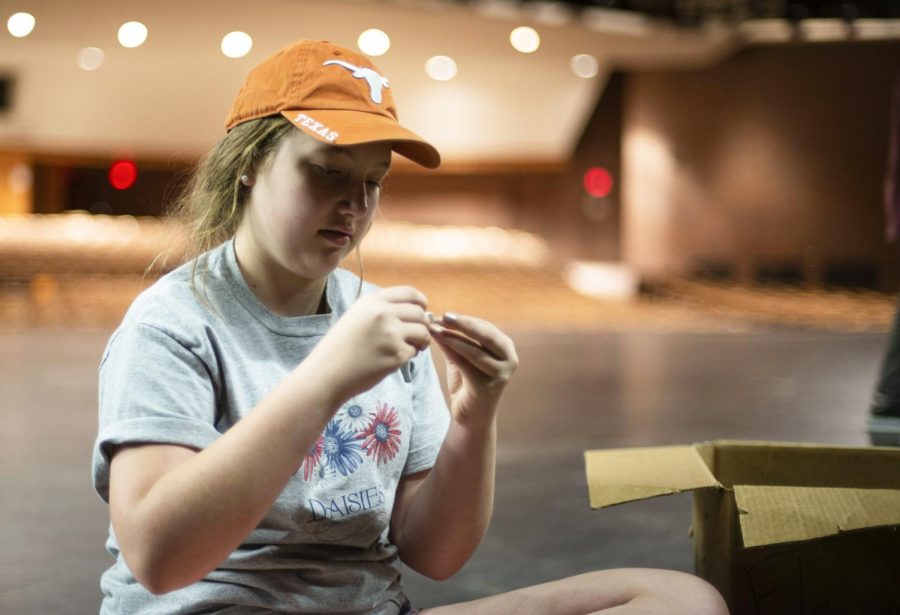 In the Greg Pakrer Auditorium, freshman Anna Holloway sits on stage Sep. 8. Almost, Maine is Holloways first show at NW.