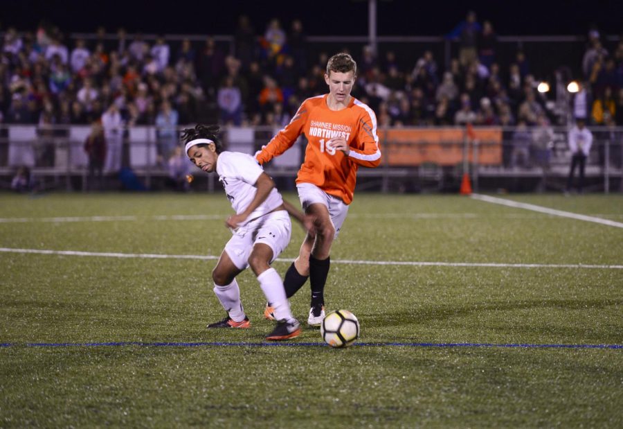 Senior Tanner Anderson, guards SM West Luis Sanchez- Moreria Oct. 18 at SMAC. The cougars tied the vikings 1-1, and moved into the playoffs. "I have faith that we are going to do well during the playoffs," Anderson said. "We have aspirations of winning the regional title and the going onto state."