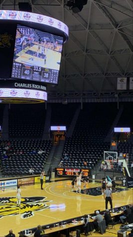 Junior Ella Mackiewicz shoots a free throw March 13 in the Wichita State Koch Arena. The girls basketball team went on to win the championship game against Topeka High 61-54.