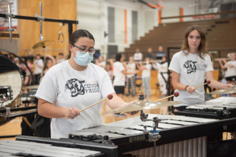 Junior Isabel Keim plays the Vibraphone Oct. 7 in the Main gym. This year’s marching band show is called “Chaos Order.” “I think the Homecoming assembly went well,” Keim said.