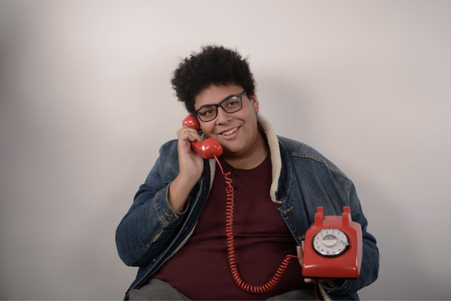 Junior Izak Zeller talks on the phone March 3 in Room 151. Zeller prefers talking on phone rather than text cause of it being a easier way to communicate properly.