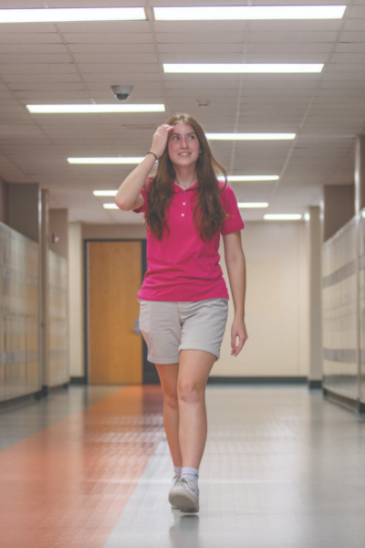 Freshman Emma Wyckoff walks Aug. 30 in Hallway One. Photo by Braden Bazzel 
