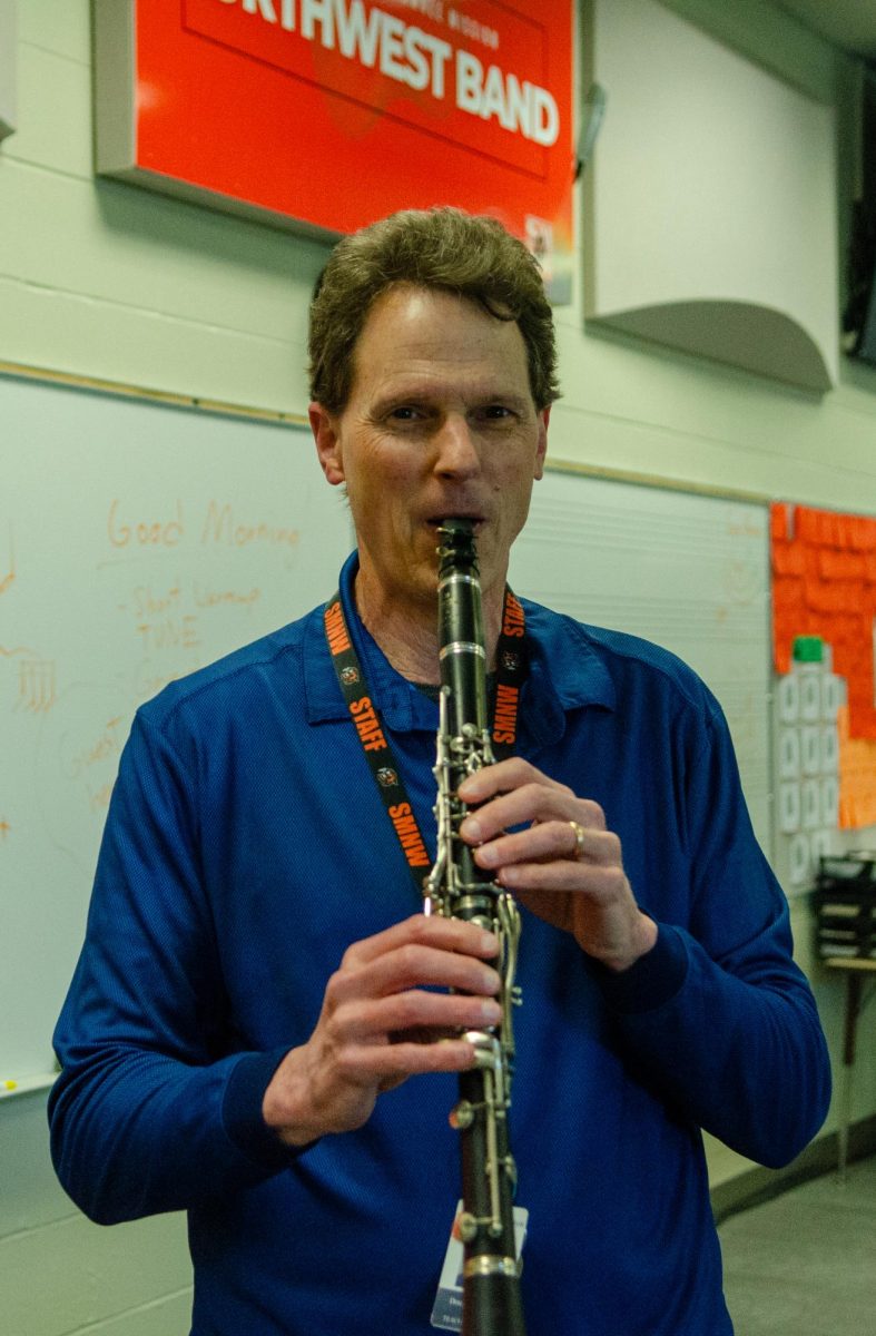 Band teacher Doug Talley plays jazz music on his clarinet May 3 in Room 39. Talley is retiring after teaching at NW for 38 years. photo by Jack Pishce